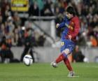 Lionel Messi κλωτσούν μια μπάλα